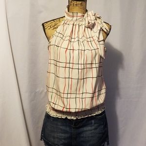 Monaco sleeveless blouse.